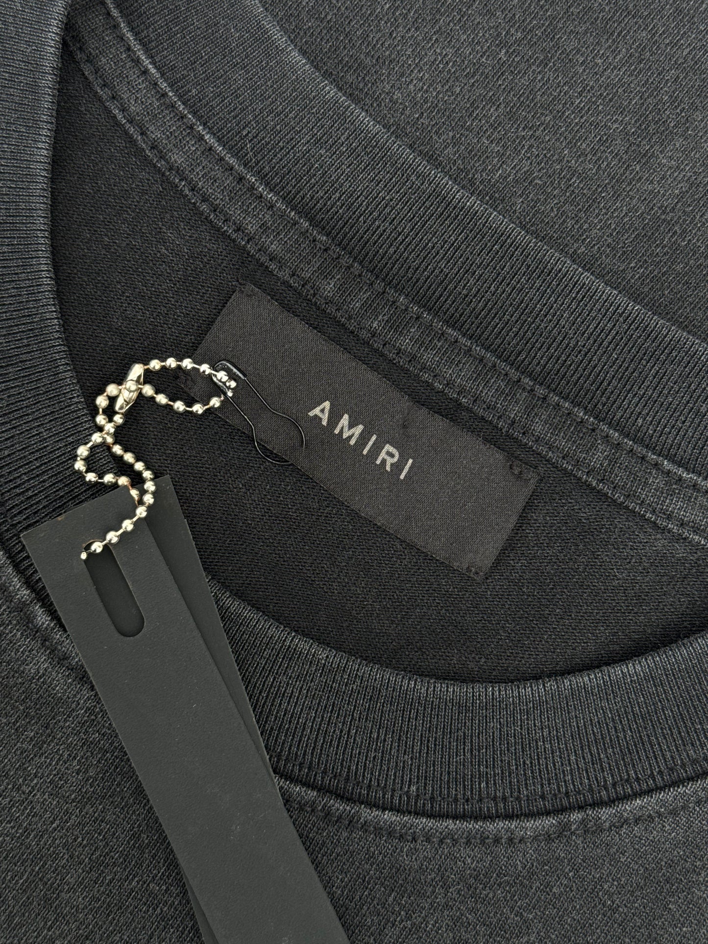 PLAYERA AMIRI