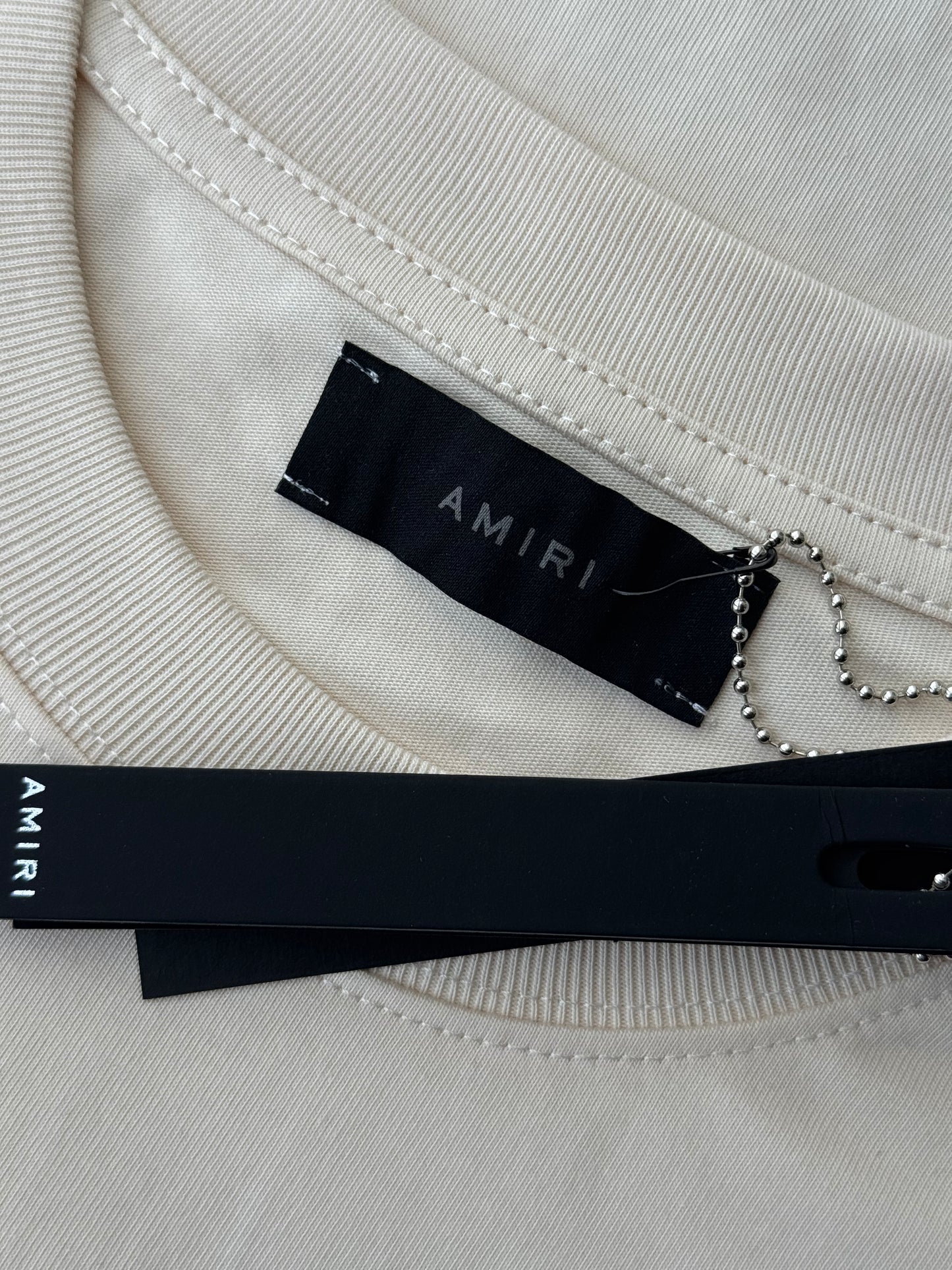 PLAYERA AMIRI
