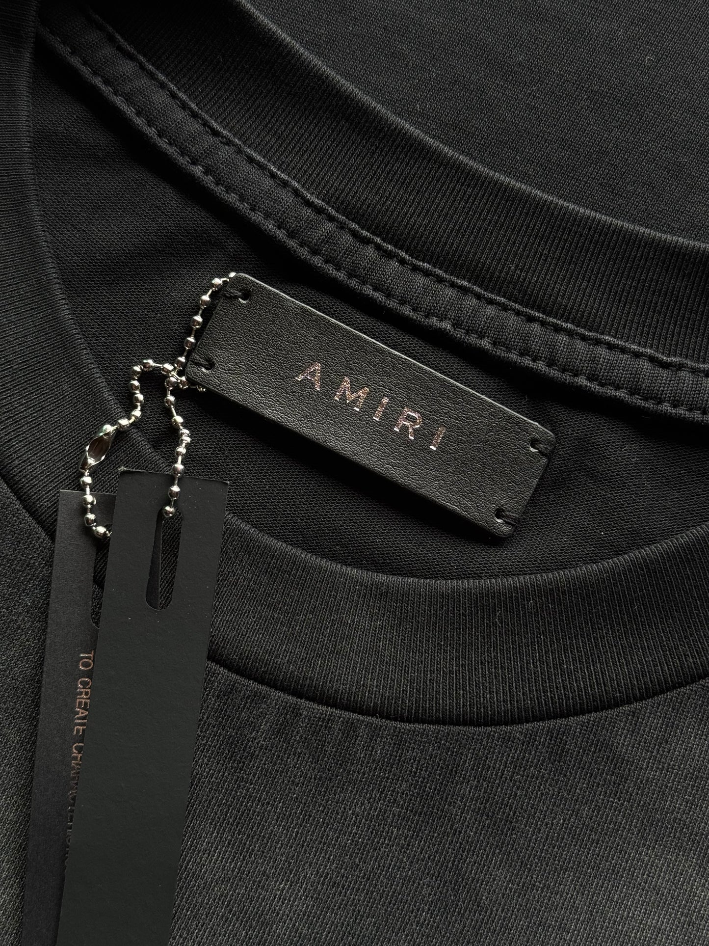 PLAYERA AMIRI