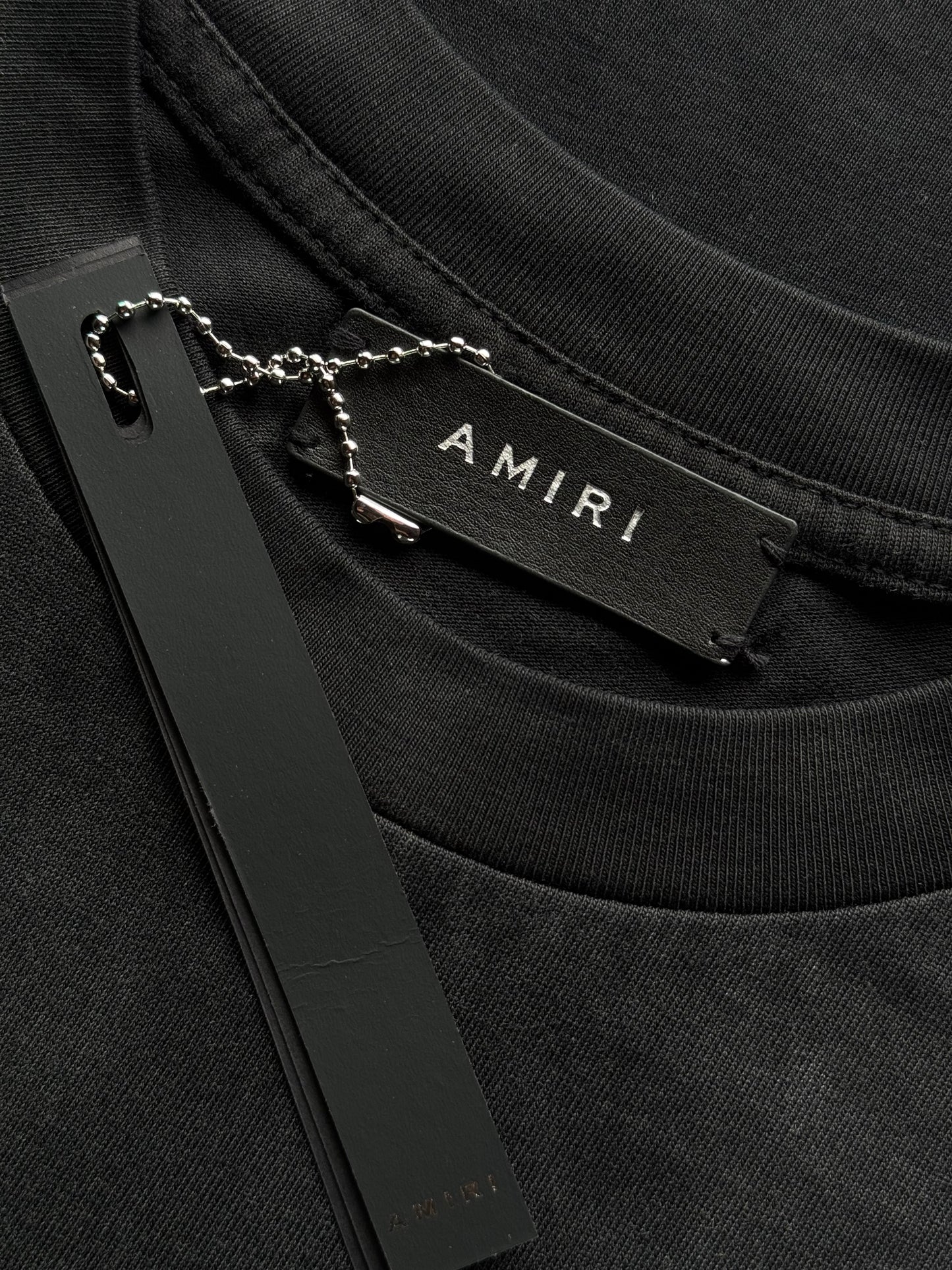 PLAYERA AMIRI